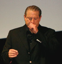 Al Gore tossindo